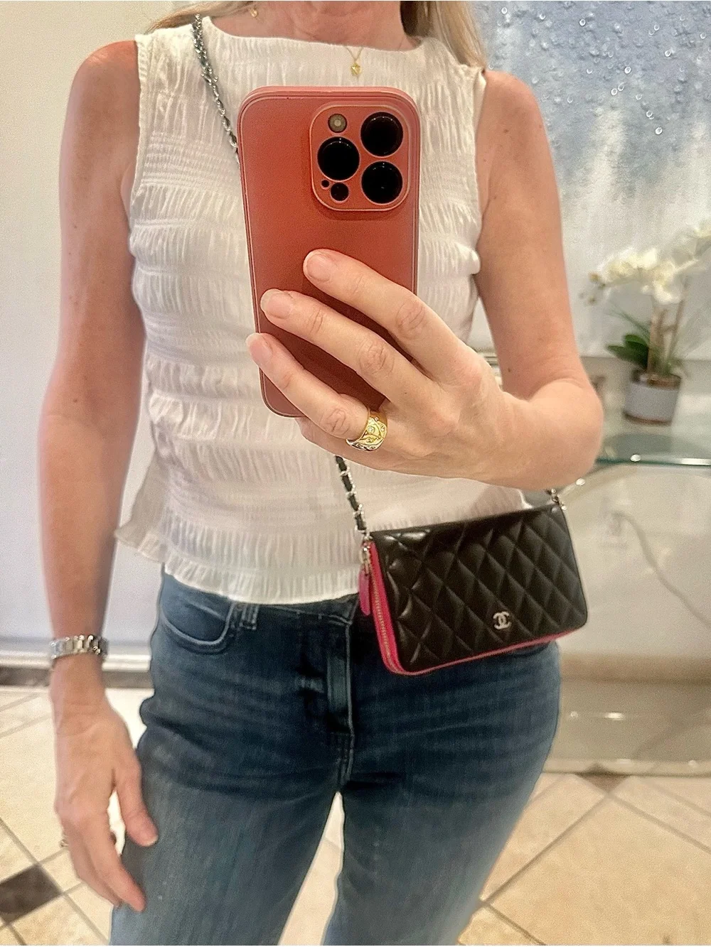 CHANEL Quilted Black Leather wallet with Chain and Pink Trim